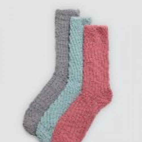 12967 Calcetines para mujer con estampado de lunares y colores lisos. Este modelo tiene puño antipresión y tacto extrasuave