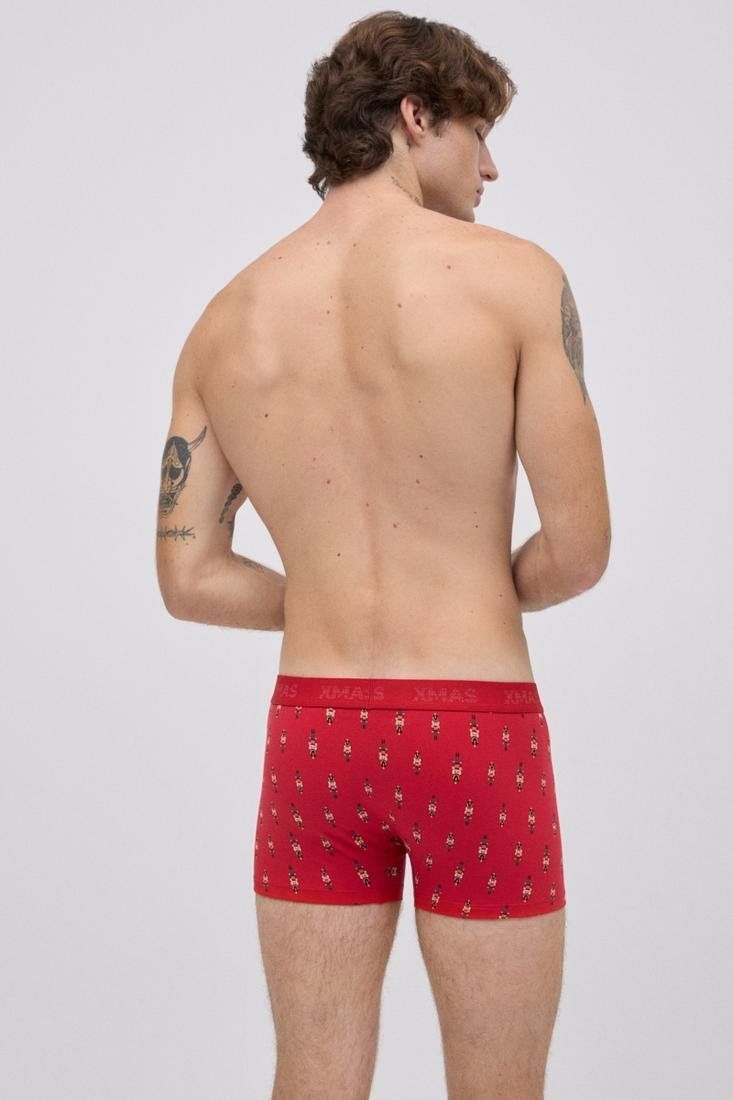 20433 Pack de un calzoncillo bóxer y un par de calcetines con estampado navideño de algodón natural