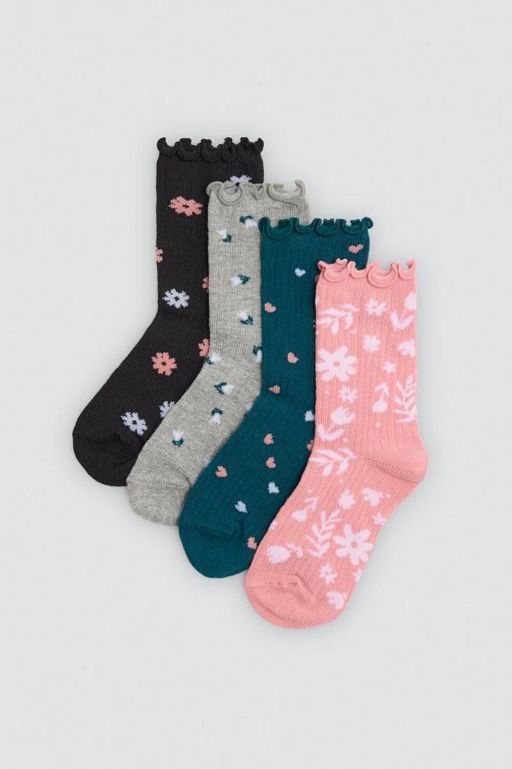 Calcetines de niña Ysabel Mora 32596 en negro, gris, verde petróleo y rosa, con estampados florales y borde superior ondulado.