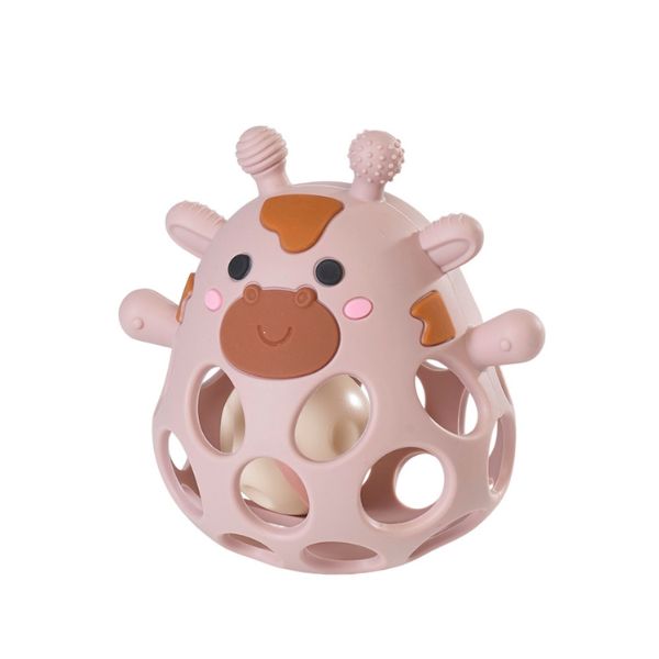 Sonajero mordedor infantil con texturas sensoriales y diseño divertido de vaca.
