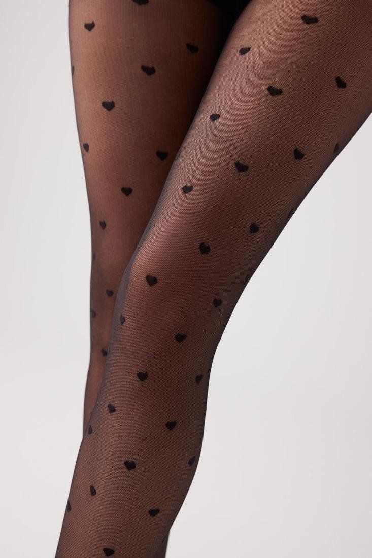 Panty negro de 20 DEN para mujer de Ysabel Mora, con estampado de lunares, demarcación y puntera invisible. Disponible en tallas M, L y XL.