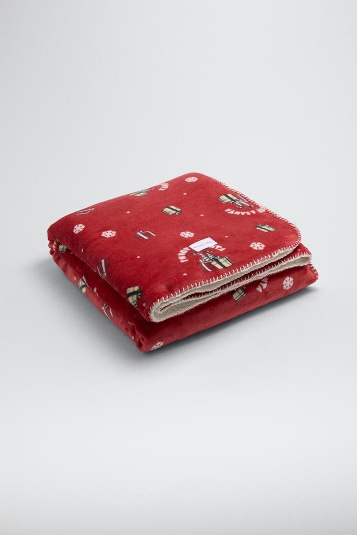 50030 Manta con estampado navideño e interior de pelo
