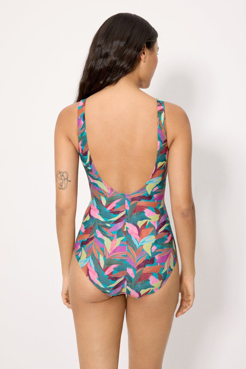 83438 Bañador reductor con efecto cruzado y estampado de hojas.